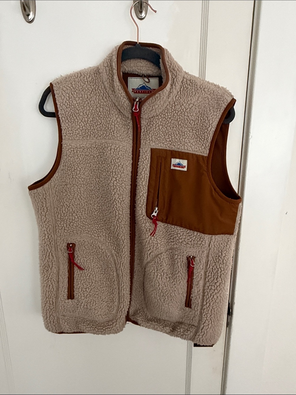 Penfield Women’s Cream Sherpa Fleece Vest with Brown Chest Pocket